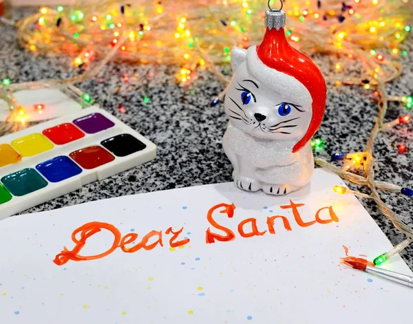 Letter Santa Paints Lights Garland Background Next Him Paints Toy — Stock Photo, Image