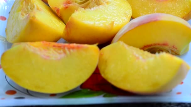 Changing Focus Point Plate Ripe Sliced Peach Soft Focus — Stock Video