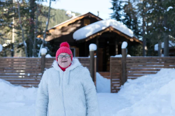 Elderly Woman Stands Smiles Happily Front Rustic Wooden House Snowdrifts — Stock Photo, Image