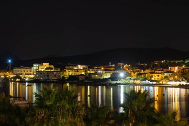 Panoramic view of the night city. In the sea of reflection of multi-colored lights