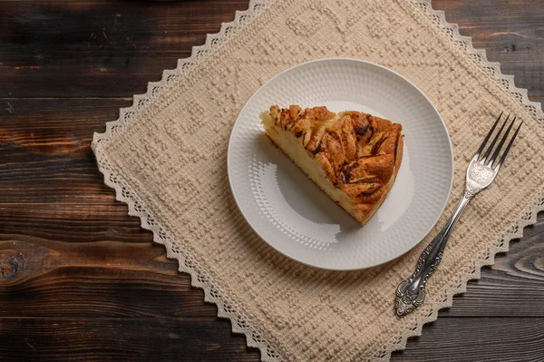 Piece of traditional homemade cornwall pie on a plate on linen napkin — Stock Photo, Image