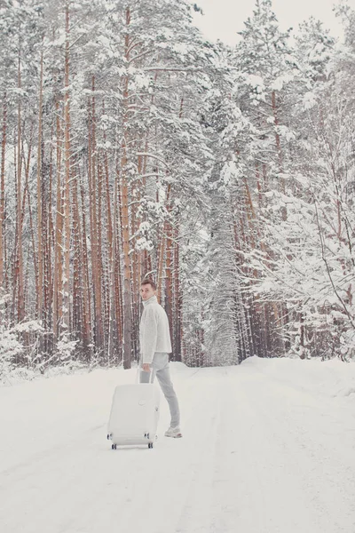 Portrait Young Fashionable Man White Clothes Walking Snow Holding Suitcase — Stock Photo, Image