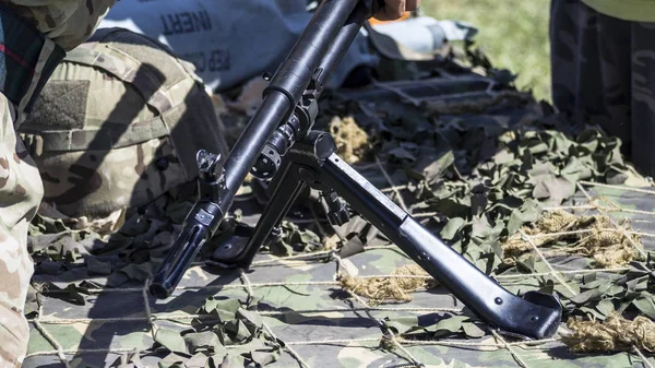 machine gun mounted on military vehicle