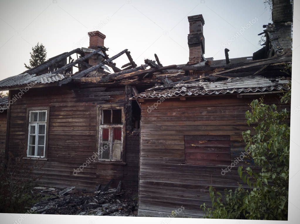  burned-down wooden house