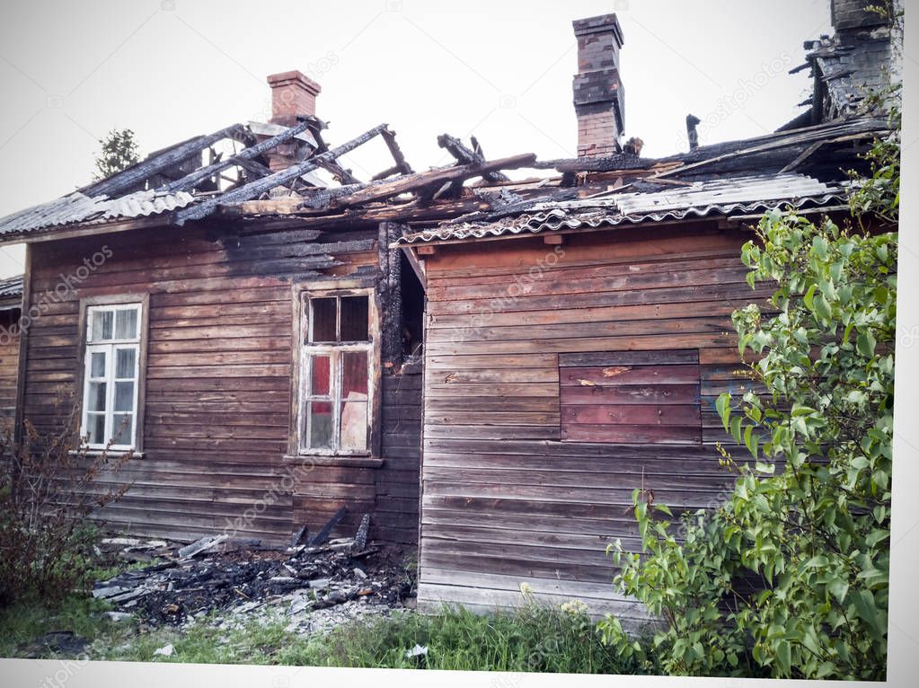  burned-down wooden house