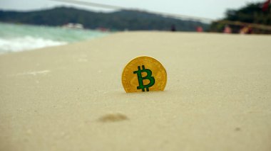 Sahilde altın bitcoin