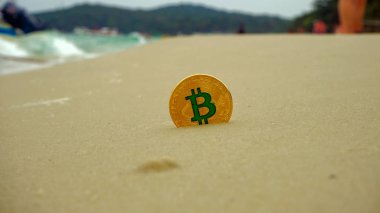 Sahilde altın bitcoin