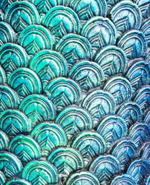 Bir tapınak duvarına Buda emanetler saklamak ve metal oymalar Buda aydınlanma tasvir kaplıdır. İnsanların hayatını tasvir eden sahneler