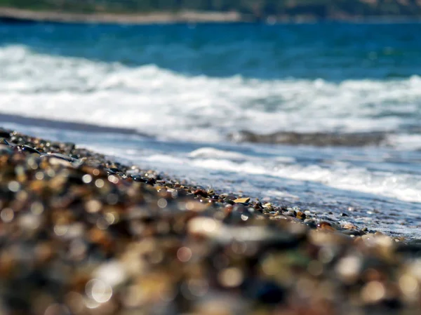 Μοτίβο με γαλάζια θάλασσα πέτρες — Φωτογραφία Αρχείου