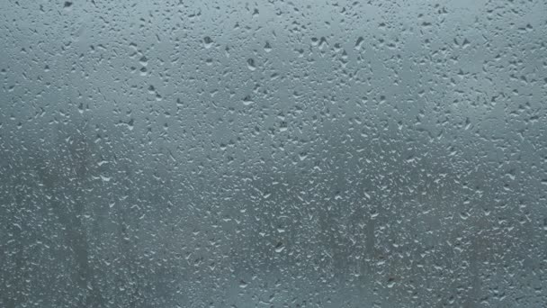 Σταγόνες βροχής στο παράθυρο — Αρχείο Βίντεο