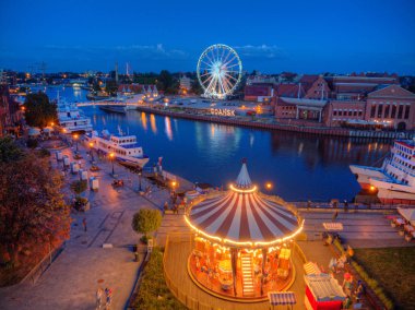 Gdansk brighting carousel at night clipart