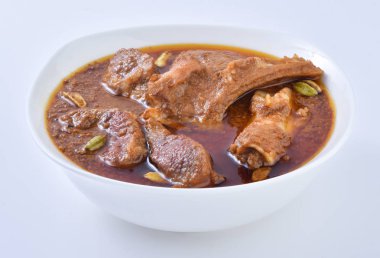 Koyun Kavurma, lezzetli et suyu veya kalın koyun etli sosu ve Hint baharat ve otlar pişmiş.