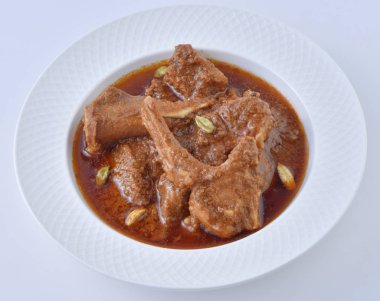 Koyun Kavurma, lezzetli et suyu veya kalın koyun etli sosu ve Hint baharat ve otlar pişmiş.