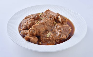 Koyun Kavurma, lezzetli et suyu veya kalın koyun etli sosu ve Hint baharat ve otlar pişmiş.