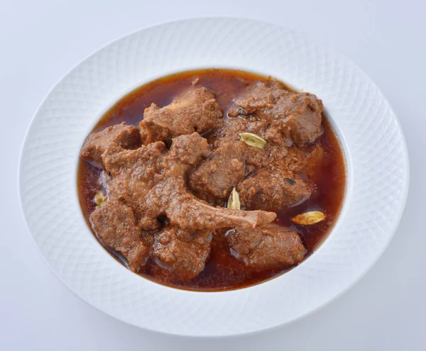 Koyun Kavurma, lezzetli et suyu veya kalın koyun etli sosu ve Hint baharat ve otlar pişmiş.