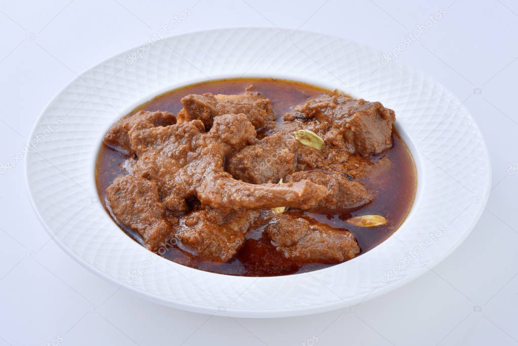 Mutton Korma, A delicious gravy or thick sauce with mutton meat and cooked in indian spices and herbs.
