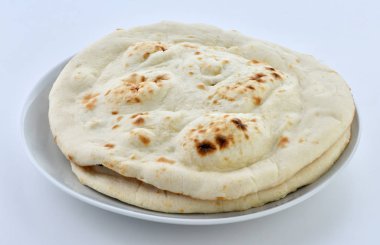 Tandır Naan veya Tandır Roti, geleneksel fırında pişmiş sağlıklı bir kabarık ekmek Tandır adı verilen.