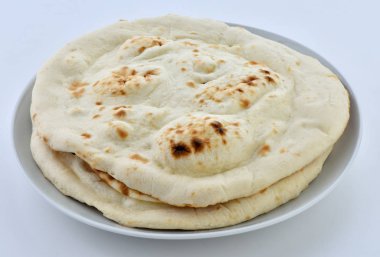 Tandır Naan veya Tandır Roti, geleneksel fırında pişmiş sağlıklı bir kabarık ekmek Tandır adı verilen.