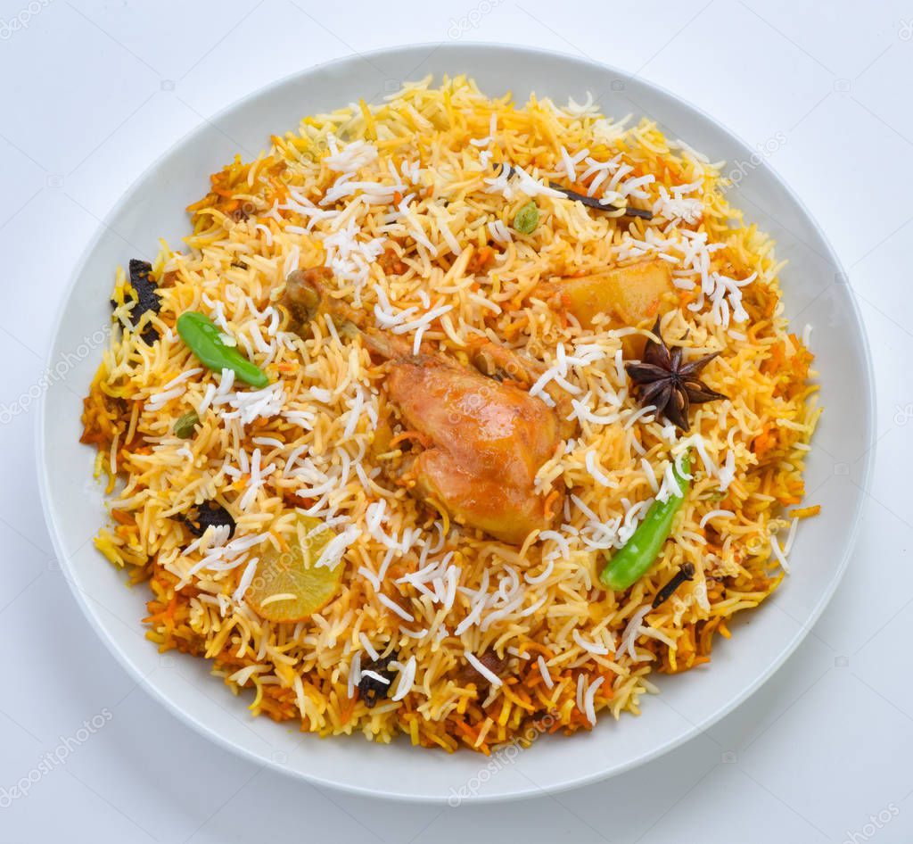 Spicy and Mouth Watering Chicken Biryani, prepared Chicken and full of spices