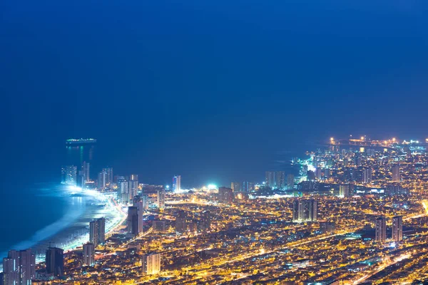 Aerial view of the port city of Iquique in the coast of the Atacama desert at dawn, Chile