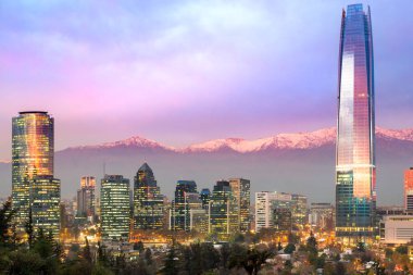 Skyline of Santiago de Chile at Las Condes and Providencia districts with The Andes mountain range in the back clipart