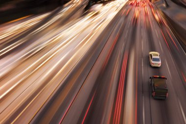 3D rendering of a high speed police chase in a highway. clipart