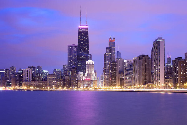 Skyline of downtown Chicago at duskin the waterfront of lake MIchigan, Illinois, United States
