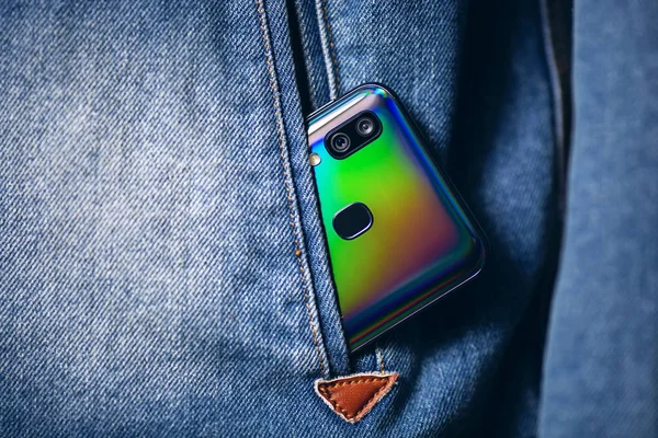 phone in jeans pocket close up