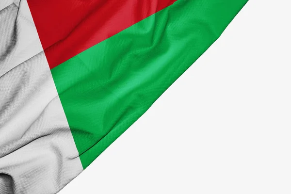 Madagascar flag of fabric with copyspace for your text on white — Stock Photo, Image