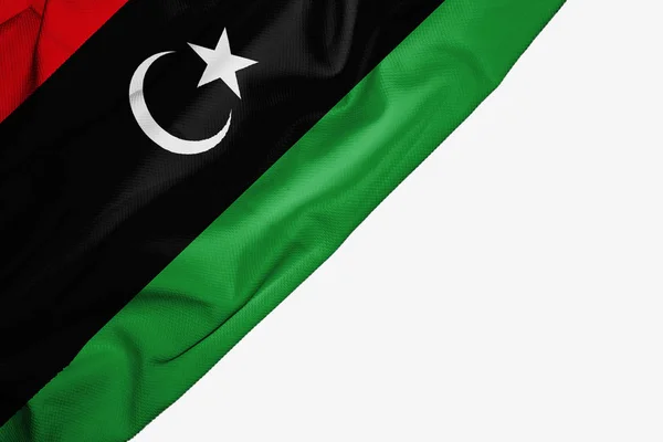 Bandera de Libia de tela con espacio de copia para su texto en el respaldo blanco —  Fotos de Stock