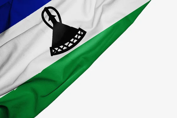 Drapeau Lesotho en tissu avec copyspace pour votre texte sur bac blanc — Photo