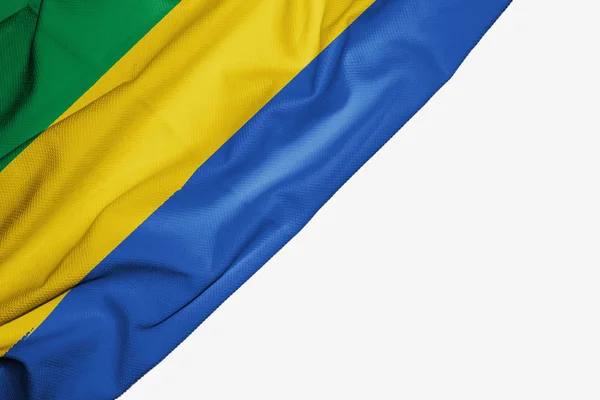 Drapeau Gabon en tissu avec copyspace pour votre texte sur fond blanc — Photo