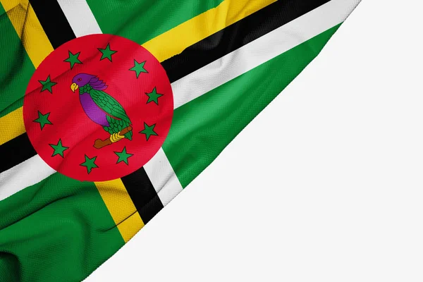 Dominica vlag van stof met copyspace voor uw tekst op wit ba — Stockfoto