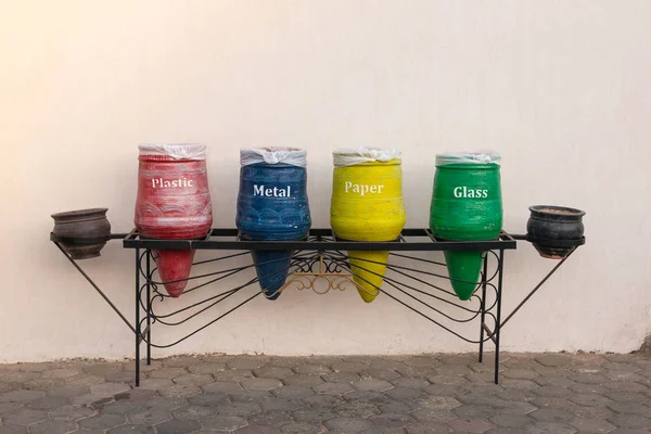 Different colored recycle waste bins