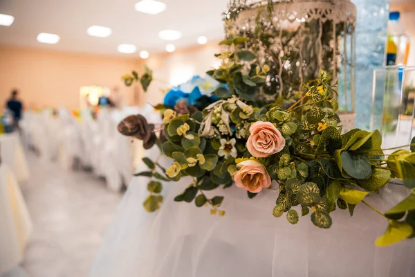Flowers as decor on the table — Stock Photo, Image