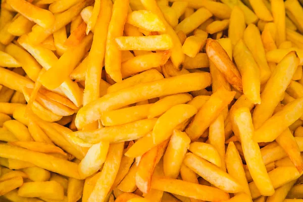 Fried potatoes in deep fryer — Stock Photo, Image