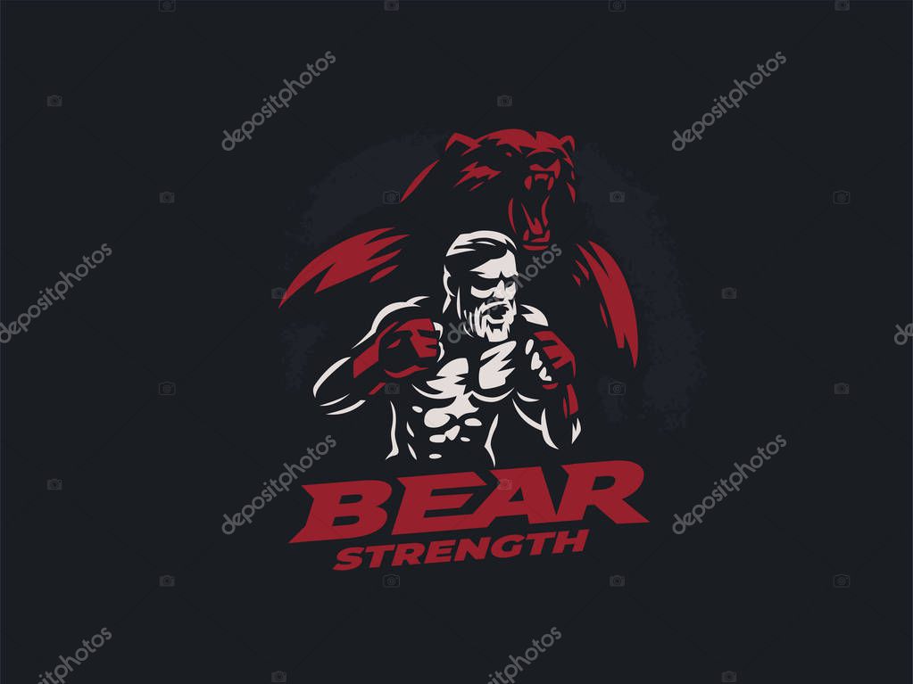 Fighter mixed martial arts is in combat stance. Against the backdrop of the silhouette of a bear.