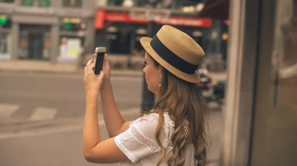 tourist taking photo in Paris