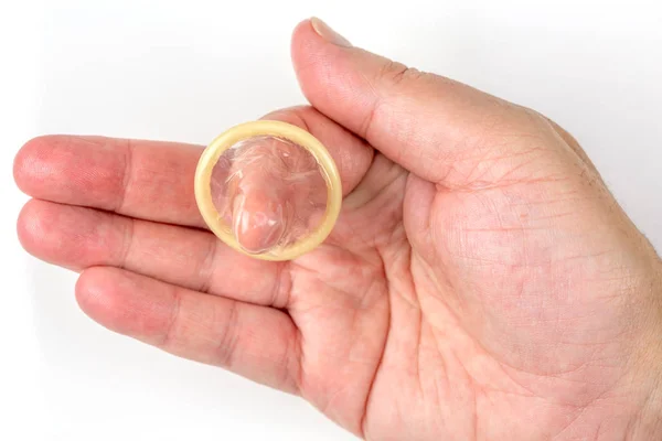 Man Finger Holding Open Condom White Background — Stock Photo, Image