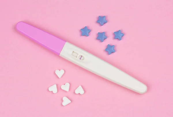 Positive Result Pregnancy Test Little Hearts Blue Stars Pink Background — Stock Photo, Image