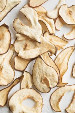 Armut meyve cips arka plan olarak, sağlıklı vegan Aperatif susuz..