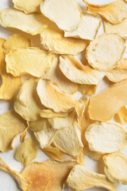 Mango veya kavun meyve cips arka plan olarak, sağlıklı vegan Aperatif susuz..