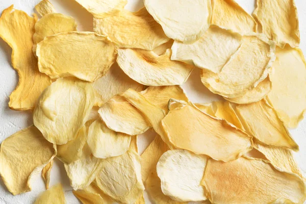 Mango veya kavun meyve cips arka plan olarak, sağlıklı vegan Aperatif susuz..