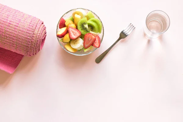 Sport Healthy Lifestyle Concept Pink Yoga Mat Fruit Berries Salad — Stock Photo, Image