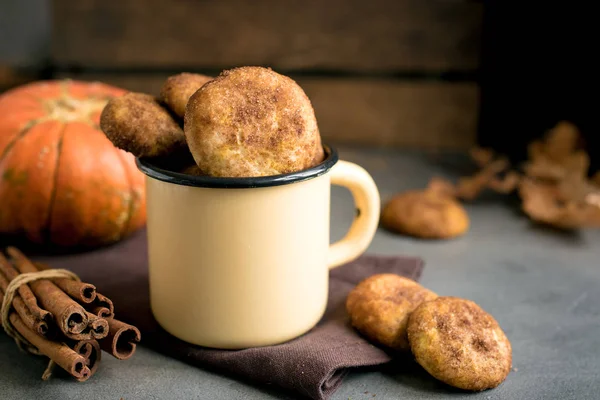 Pumpkin Snickerdoodle Cookies.  Seasonal Autumn Homemade Cookies in rustic mug. Traditional desert Snickerdoodles for Autumn.