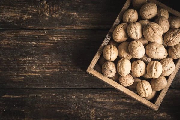 Organic Walnuts Rustic Wooden Box Top View Copy Space Seasonal — Stock Photo, Image