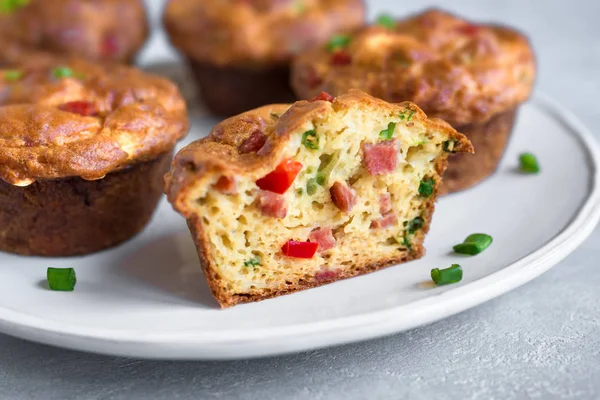 Protein breakfast egg muffins with bacon and vegetables. High protein muffins for ketogenic or paleo diet, close up.