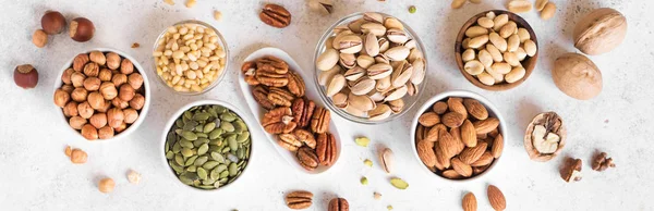 Various Nuts in bowls — Stock Photo, Image