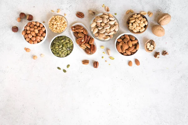 Various Nuts in  bowls — Stock Photo, Image
