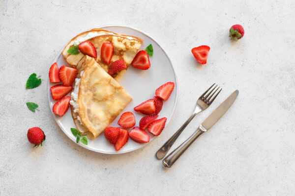 Crepes with strawberries